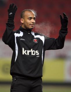 Elliot Omozusi