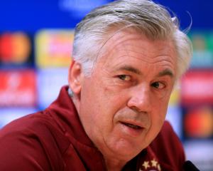 Bayern wrap up title in style with emphatic win at Wolfsburg