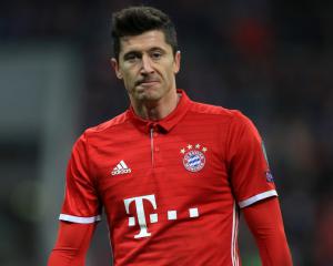 Bayern stroll to victory over rivals Dortmund