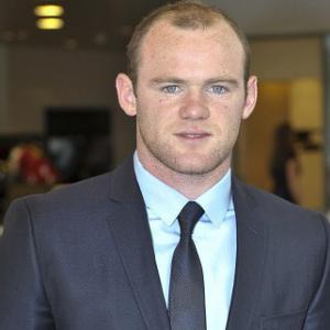 Rooney 'to consider phone hacking action'