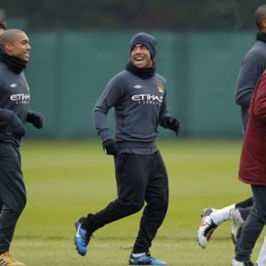 Wantaway City captain Carlos Tevez begs United manager Sir Alex Ferguson to take him back