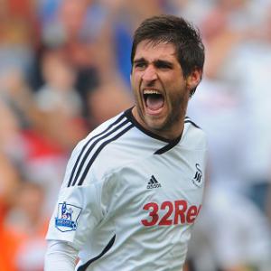 Swans recover to secure draw