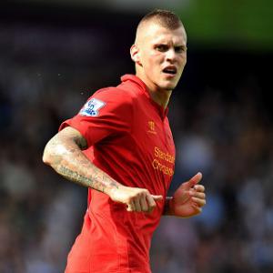 Skrtel commits long term future and pens new Reds deal