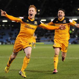 Tigers claw into promotion spots