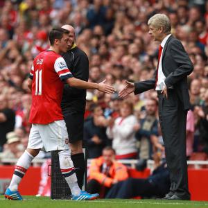Ozil impressed by Wenger