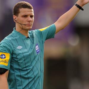 Referee arrested over hacking claim