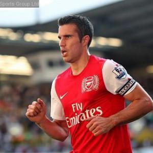Van Persie treble as seven-up Arsenal rout Rovers