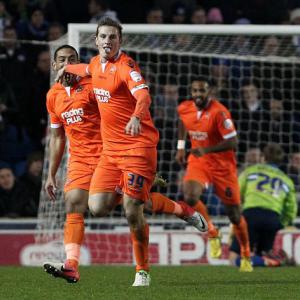 Wood's brace earns Lions share