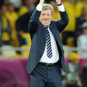 Hodgson will change team for Rooney