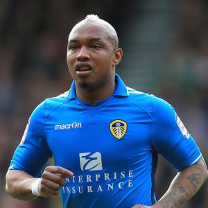 Man charged in Diouf abuse probe