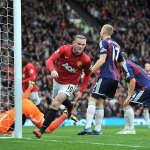 Rooney double secures United win