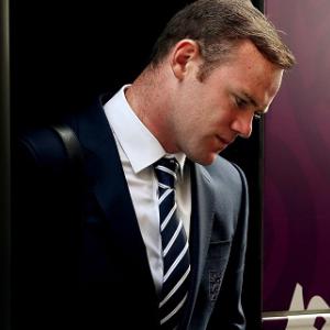 Rooney bowed by Auschwitz trip