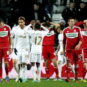 Swans squeeze into last four