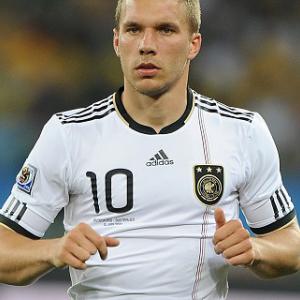 Podolski nets two in Arsenal win