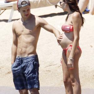 Dad-to-be Jack Wilshere soaks up Sardinian sun with Lauren Neal