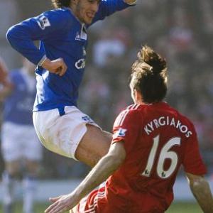 Everton star Fellaini out for six months after clash with Reds bruiser Kyrgiakos
