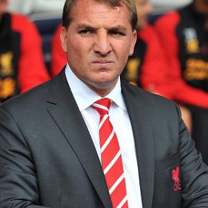 Rodgers plays down Carroll absence