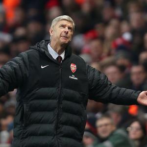 Wenger calls for players to respond