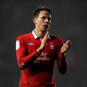 Gunter joins Mariappa at Reading