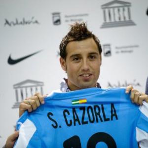 Cazorla and Joaquin help Malaga open their account