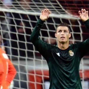 Real, Malaga coast to Champions League victories
