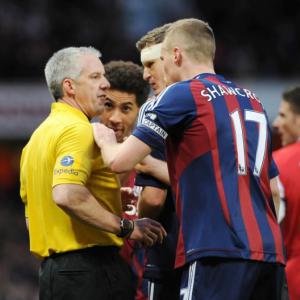Owen in hot water for Arsenal punch