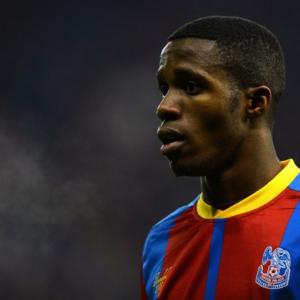 Man Uniteds Zaha charged over rude gesture