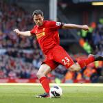 Liverpool defender Jamie Carragher prepares to sign off