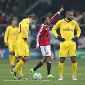 Gunners mauled in Milan