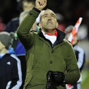 Di Canios Swindon shock Wigan