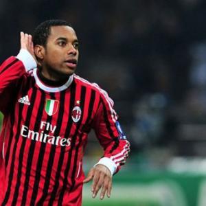 Four-goal Milan leave Arsenal hopes in tatters